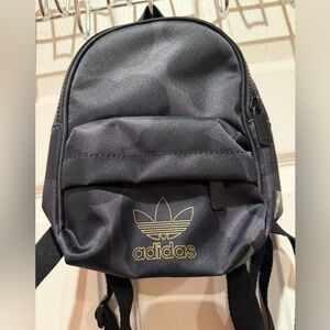 Adidas Black and Gold Mini Backpack